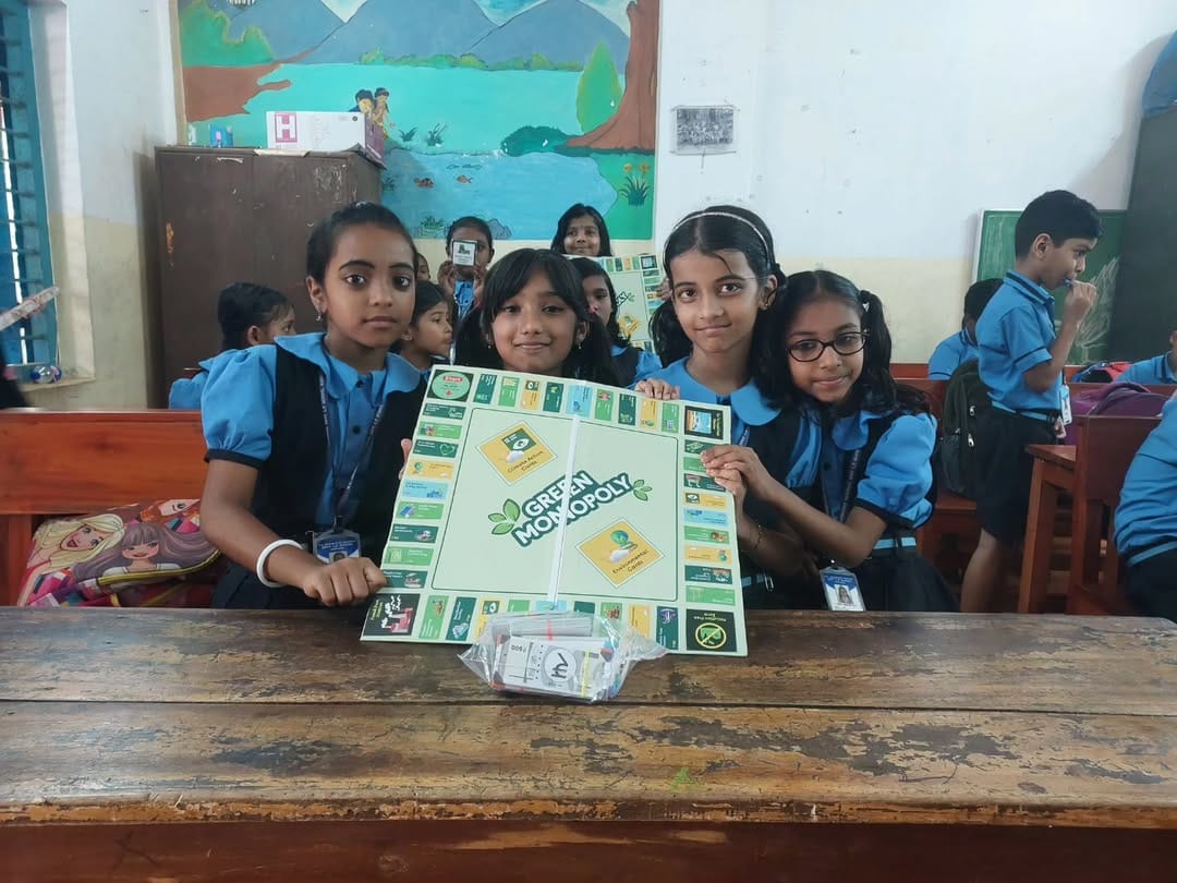 2 volunteers distributed 5 Green Monopoly kits created by Tata Communications employees to support environmental awareness and play-based learning for 30 students at MAAM LP School, Kakkanad.