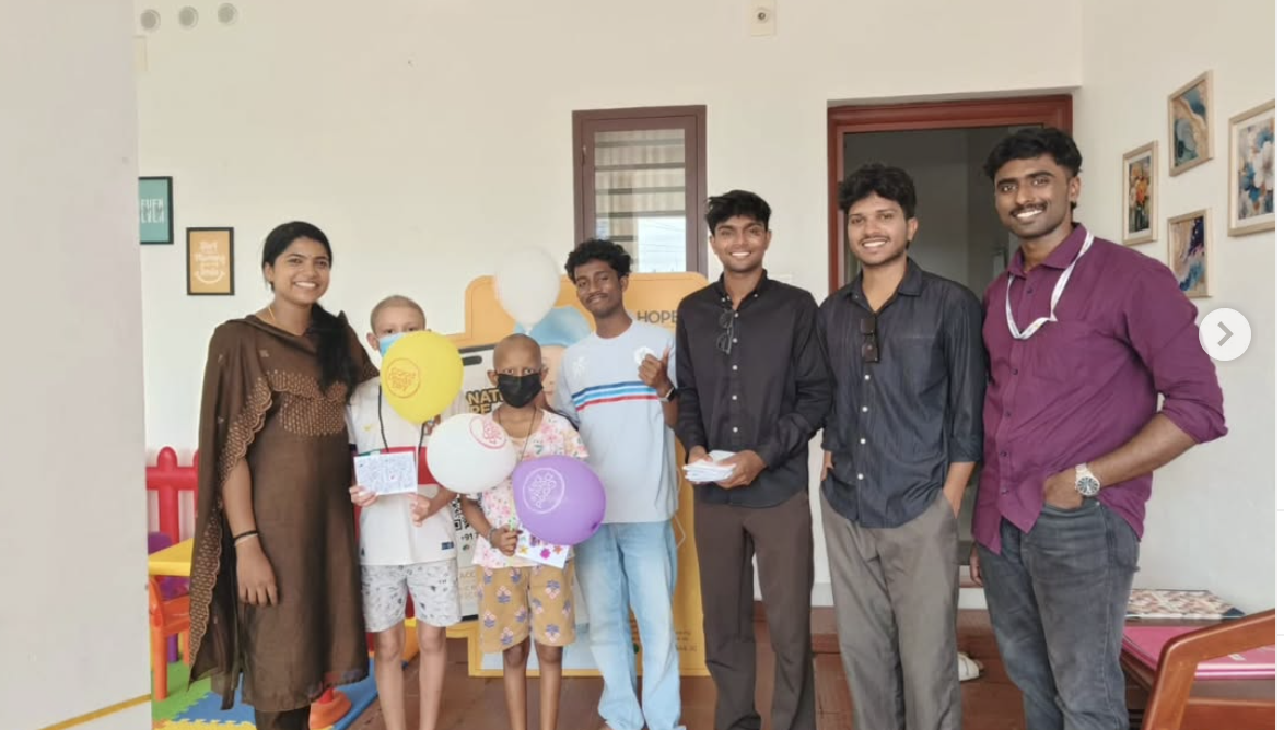 3 volunteers distributed handmade pop-up books and engaged children undergoing long-term treatment at Hope Home Cancer Care Centre, Cheranalloor, fostering joy and emotional support through meaningful interaction in Ernakulam.
