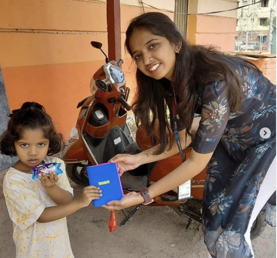 3 volunteers distributed 20 pop-up books created by HDFC ERGO employees in collaboration with Being Jigyaasu to support children with interactive learning materials in a slum community at Ukkadam in Coimbatore.
