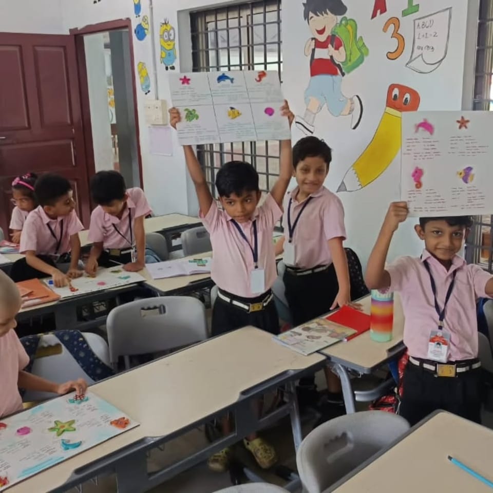 2 volunteers donated EY-created ocean clay models to support marine-life learning for 30 students at BTS LP School, Edapally, Kochi.